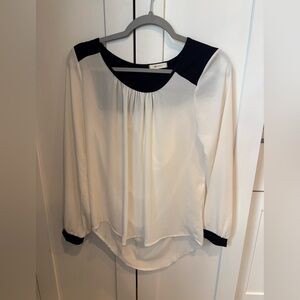 Everly White Blouse with Black Trim. Flowy, dressy top